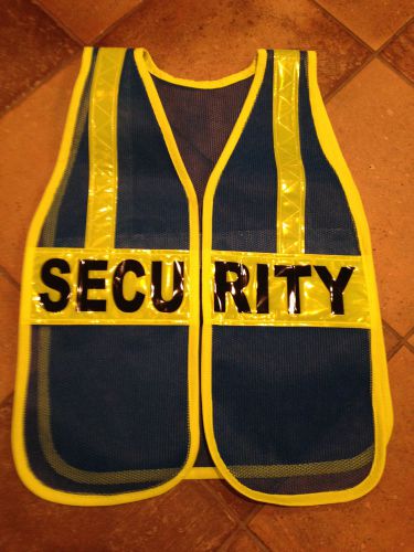 New and improved blue safety vests with security signs for sale