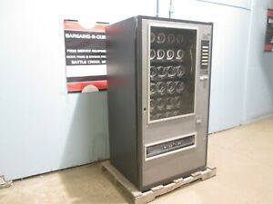 COMMERCIAL COIN OPERATED LIGHTED 30 SELECTIONS SNACK/CIGARETTE VENDING MACHINE