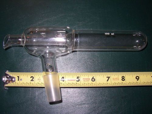 Fixed volume repetitive dispenser, 100 ml, 24/40 joint, unknown brand.