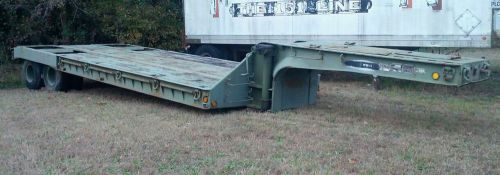 Step deck trailer, oil field equipment