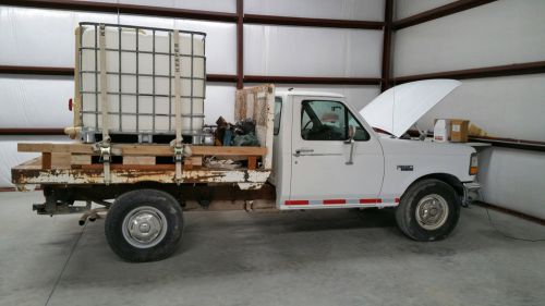 Ford f25 flat bed, water truck, with 400 gallon water sprayer and gas pump for sale