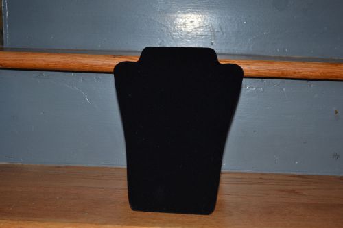 small black velour display for a necklace