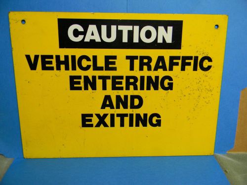 VINTAGE CAUTION VEHICLE TRAFFIC ENTERING AND EXITING CONSTRUCTION TIN SIGN