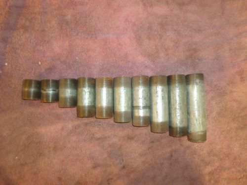 10, 1 1/4&#034; Galvanized nipples, new, with varied lengths.