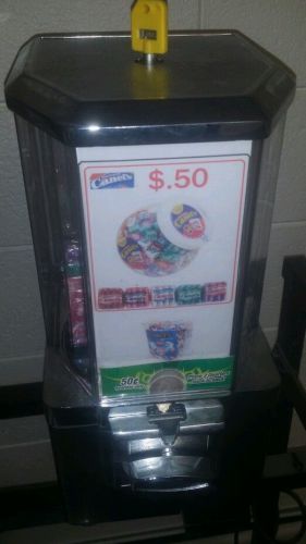 $.50 Canels Gum gumball vending machine and gum