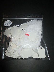 PRICE TAG WITH STRING  WHITE  5/8 X 31/32  (#1218)  100 per package