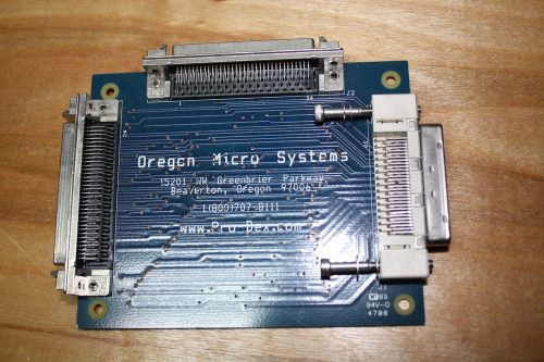 2 oregon micro systems 68 pin breakout boards(pn1591-0000000) 1 new never opened for sale