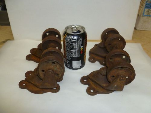 4-  Vtg swivel dual wheel iron casters with 2 3/8&#034; wheels base is 4 3/8&#034;x3 1/4&#034;
