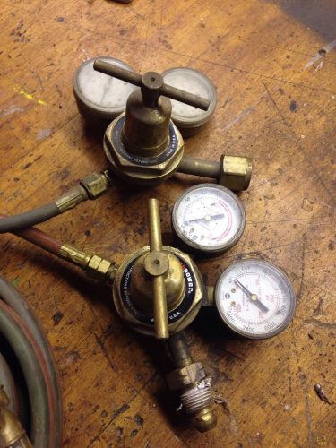 Cutting torch with hoses and regulators for sale