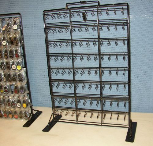 Free standing wire display rack 96 hooks black lockable good condition w/ cover for sale