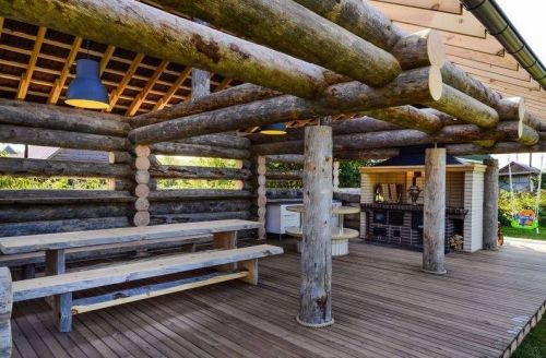 Scandinavian Log Homes for Sale - Silver-Grey Log Home Outdoor BarBQ