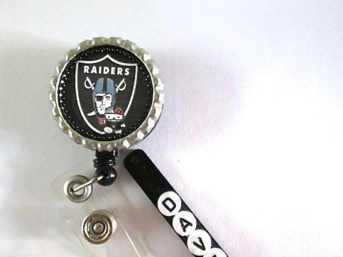 ID BADGE RETRACTABLE REEL HELLO KITTY,RAIDERS ,NURSE,GRADS,FOOTBALL,ICU,TEACH,