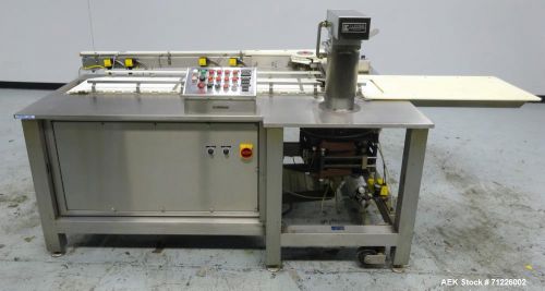 Used- tl systems model t-1700 tray loader. approximate 60 pieces per minute, 200 for sale
