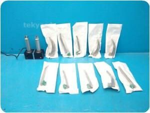 HEINE LARYNGOSCOPE HANDLES W/ NT 300 CHARGING BASE &amp; BLADES @ (268462)