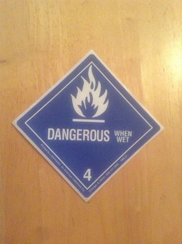 Official D.O.T Warning Sticker: Dangerous When Wet