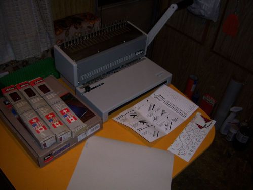 Ibimatic plastic book binding machine with binding covers and spines