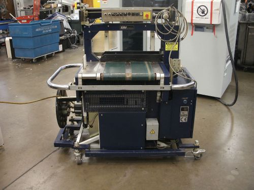 Eam mosca strapping machine ro-tr500pa, fully automatic w/ powered conveyor for sale