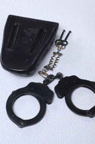Peerless police style metal handcuffs with tooled leather case &amp; keys for sale