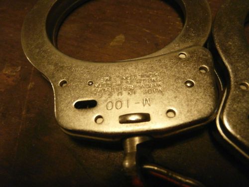 Smith and Wesson Model m-100 handcuffs and restraint chine