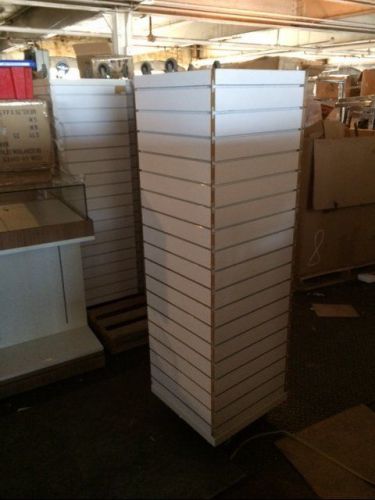 Rolling slatwall tower rack upscale white used store fixtures impulse display for sale