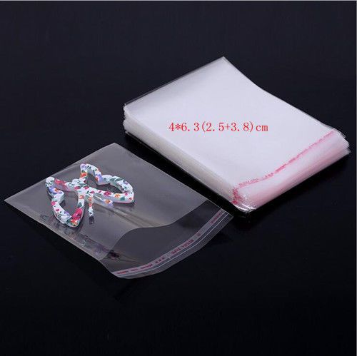 New 100pcs Clear Transparent Self-adhesive OPP Seal Plastic Jewelry Bag Package