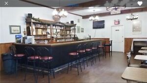 COMMERCIAL BAR, with back bar and foot rail, wood, in very good condition.