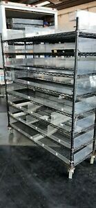 Metal Wire Shelving Units on heavy duty wheels for business or home use, black,