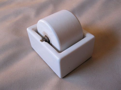 Vintage porcelain desktop wet stamp roller/ dispenser for sale