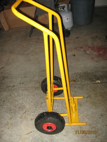 New surplus jack hammer cart, yellow with pnuematic tires for sale