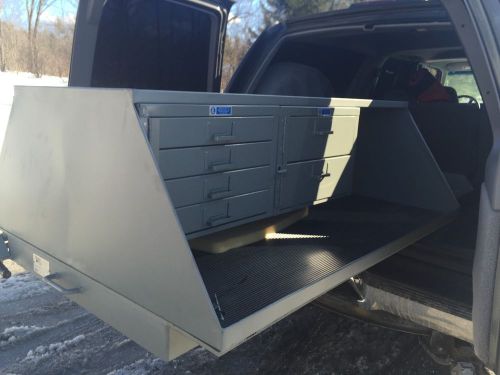 Extendo bed with storage compartments / can be locked ex shape fire police ems for sale