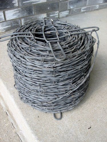 60 LBS UNUSED ROLL OF BARBED WIRE GALVANIZED