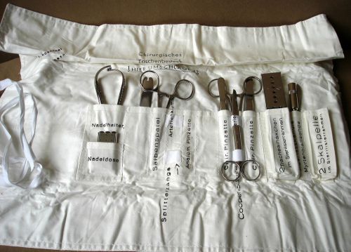 Unused 11 Surgical instruments in roll-up cloth, German Army Field Hospitals