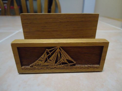 Wood buisness card holder with a ship on it