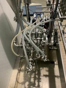 GLOBALTEK MODEL CON-0845 4-PISTON FILLING MACHINE