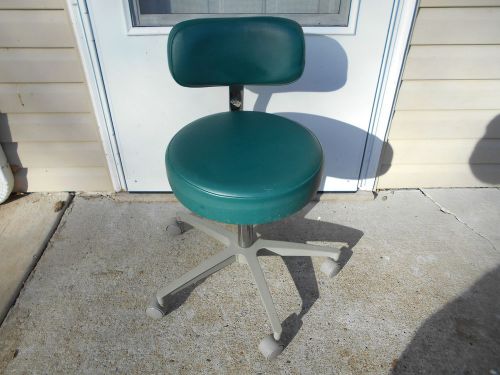 Marus doctors stool with green vinyl fabric seat back rest, beige enamel finish for sale