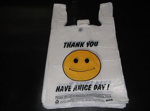 Plastic shopping bags,t shirt type grocery bags,happy face white 550 big  bags. for sale