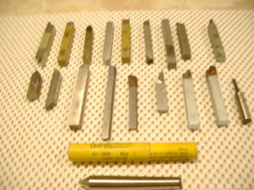 Assortment of various lathe tool bits and a lathe center no. 1 taper for sale
