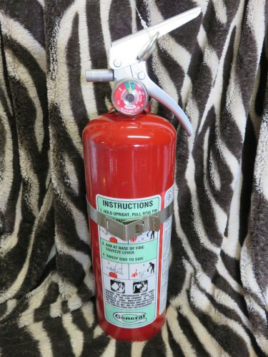 (general) 5lb halon fire extinguisher with vehicle bracket perfect condition for sale
