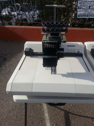 Melco EMC6T  - 6 Needle Tajima Black Head Commercial Embroidery Machine