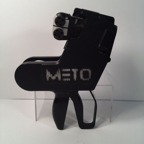 Used, meto 2-line pricing gun,with 12 rolls adhesive labels and 1-rolls of sale for sale