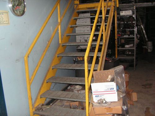 steel shelving with stairs and cat walk grate