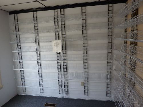 2 + ROOMS OF GRID WALL SHELVING 43 FOOT BY 7 FOOT HIGH IN VERY GOOD CONDITION