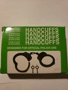 Handcuffs designed for official police use, double lock black steel