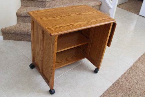 20&#034;x30&#034; oak utility table with 2&#034; caster wheels for sale