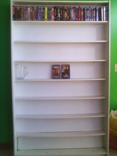 8 shelf wood display case pictures, movies small books etc L49&#034; x H 83&#034;