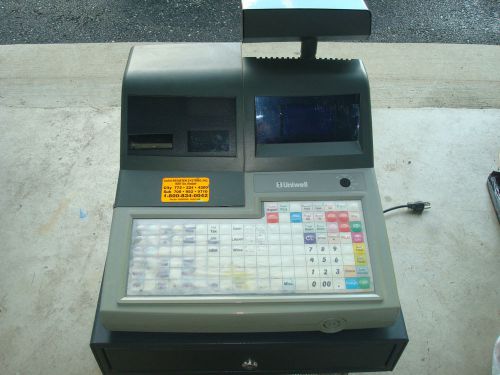 uniwell ex-570f cash register  pos terminal scanner included