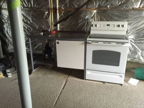 GE electric range white with Steel table and with right sink