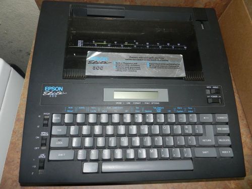 Epson Elite 300 Portable Electronic Typewriter + and extra correction ribbons