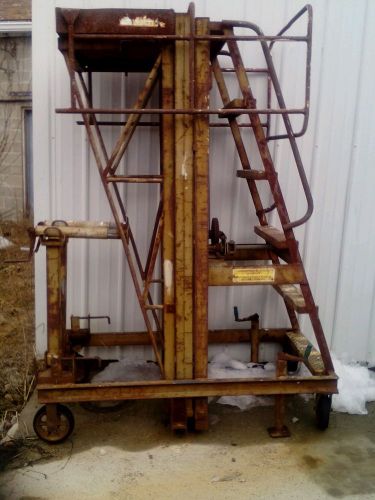 E-z  rizer push around elevating work work platform ladder manual lift for sale