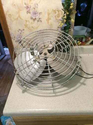 Wall mount vintage fan  cooling fan  1/4 hp g. e. motor metal blades heavy for sale